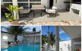 Casa Guarujá Esquina com Beira mar com Piscina grande na Enseada Pé na areia 50 metros